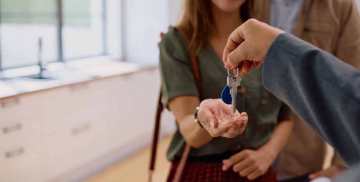 Handing the keys over for new home.